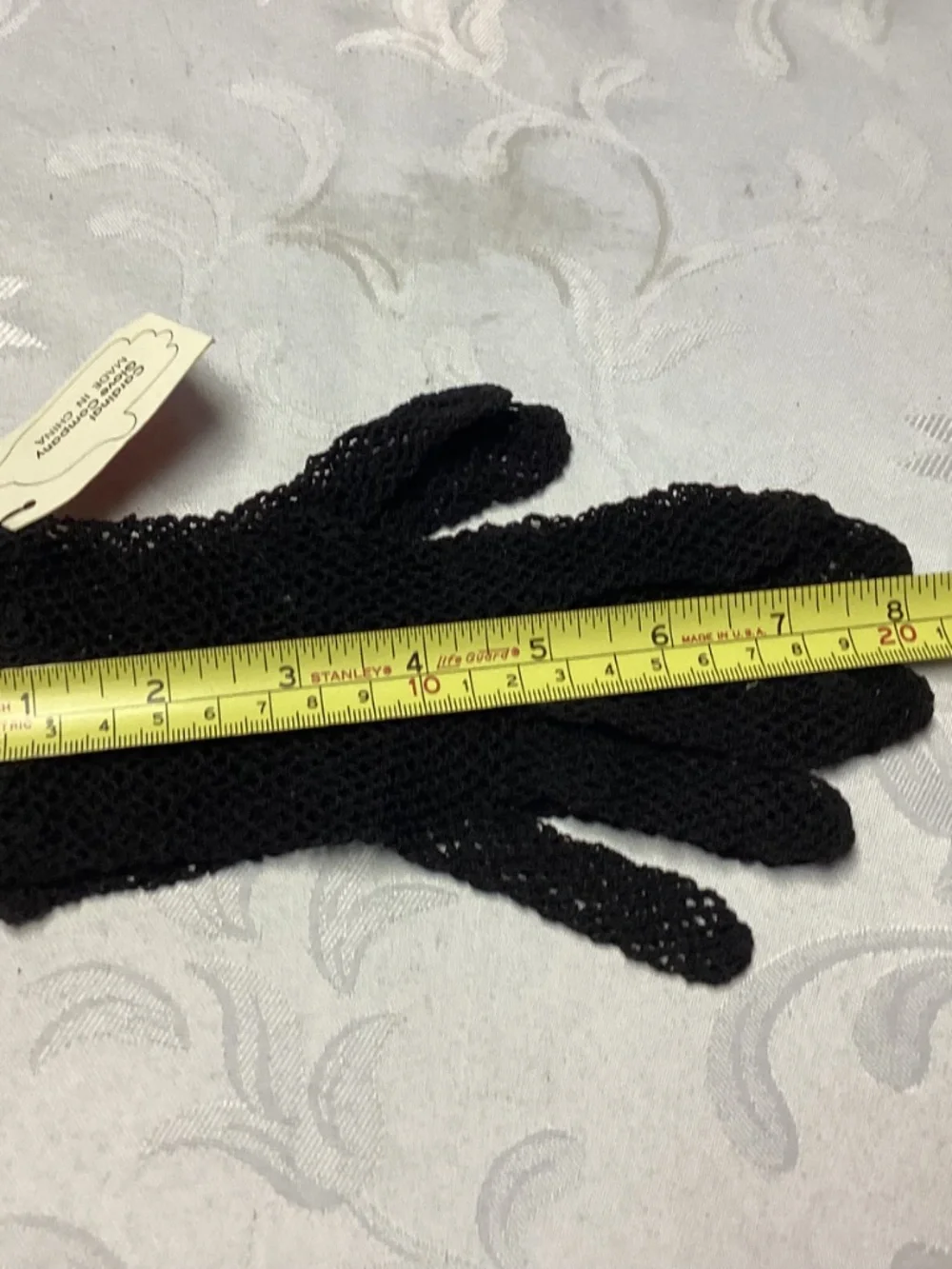 Black fishnet gloves never worn absolutely gorgeous. Detailed